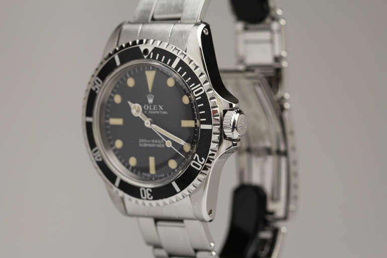 This is a great example of a Rolex Submariner, Ref. 5513. It has a beautiful original dial with great patina and matching hands. The stainless steel case is in excellent condition with very little wear. The movement is in good working order and the