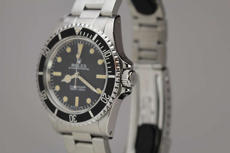 This is a great example of a Rolex Submariner, Ref. 5513, circa 1983. It has a beautiful original dial with great patina and matching hands. The stainless steel case is in excellent condition with very little polish wear. The movement is in good