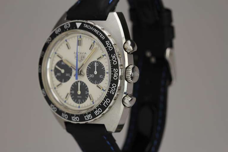 This Heuer Autavia chronograph wristwatch is commonly known as the Jo Siffert edition, named for the Swiss Formula One racer who wore and promoted the model for Heuer. Usually, the it comes with a black dial, but the present example has a silvered