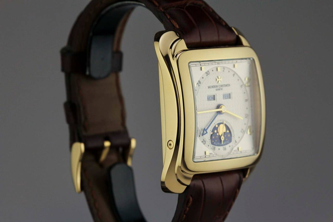 This is a Vacheron Constantin Toledo 1952 Triple Date Moon Phase model 47300-000J  in 18K yellow gold with an automatic movement.  Comes on  Vacheron Brown alligator strap in worn but very good condition along with 18K yellow gold Vacheron tang