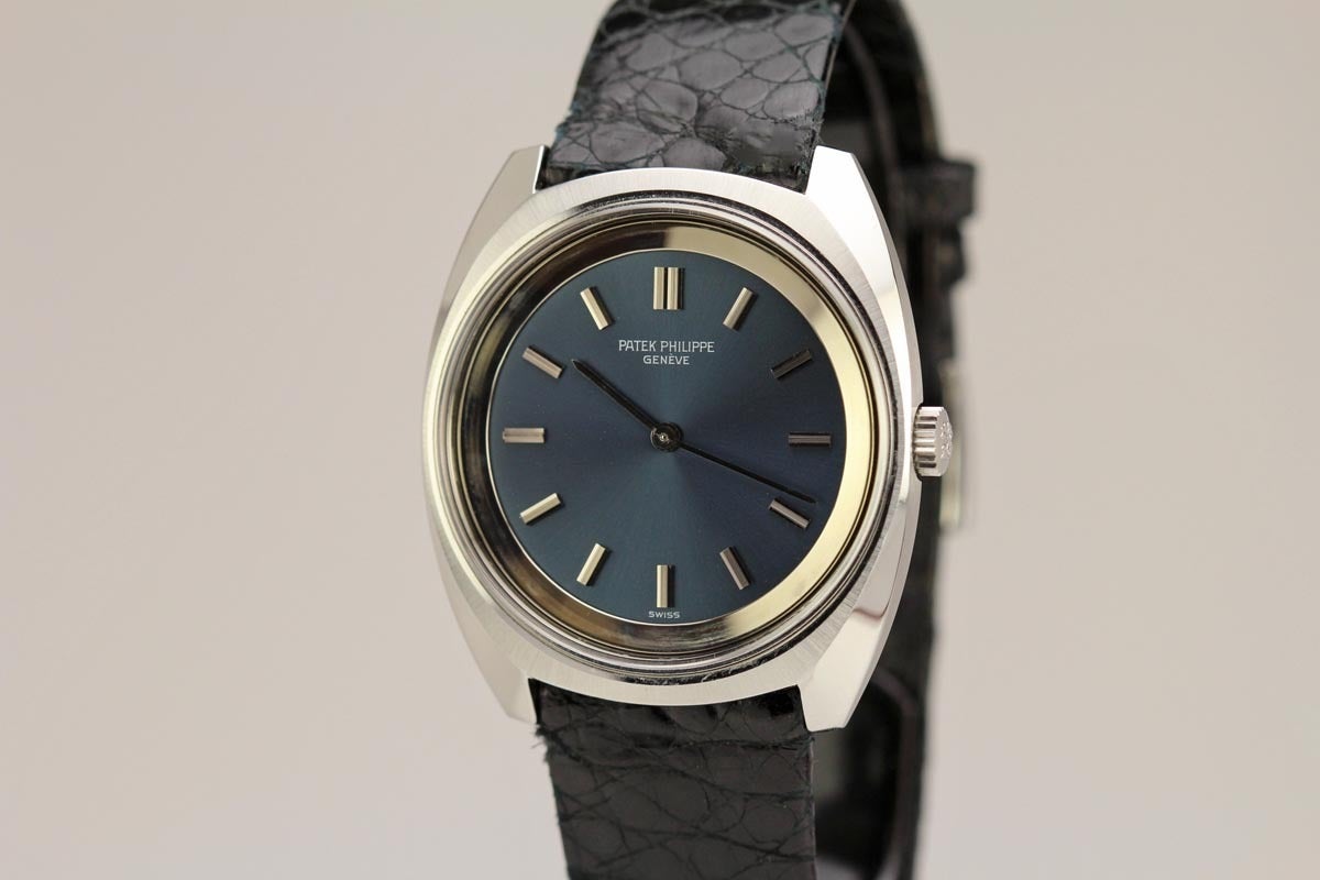 Patek Philippe Stainless Steel Ref 3579 comes on a Patek Philippe strap and tang buckle.