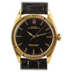 Rolex Yellow Gold Chronometer Wristwatch with Black Dial Ref 1007 circa 1960s