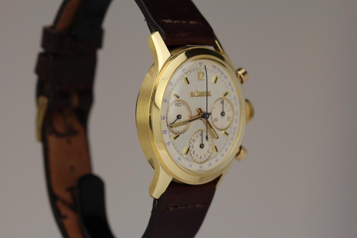 This is an excellent example of a beautiful 18k LeCoultre chronograph from the 1960s.  It is a manual wind watch and is powered by the caliber Valjoux 72.