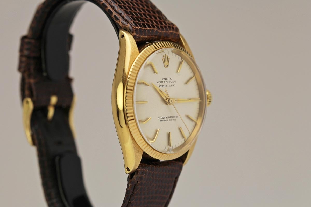This is a classic Rolex Oyster Perpetual Ref 1005 Retailed by Serpico Y Laino.