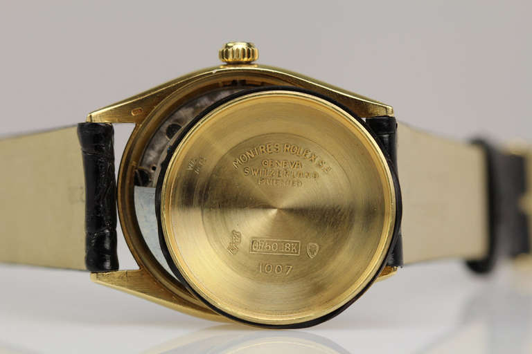Men's Rolex Yellow Gold Chronometer Wristwatch with Black Dial Ref 1007 circa 1960s