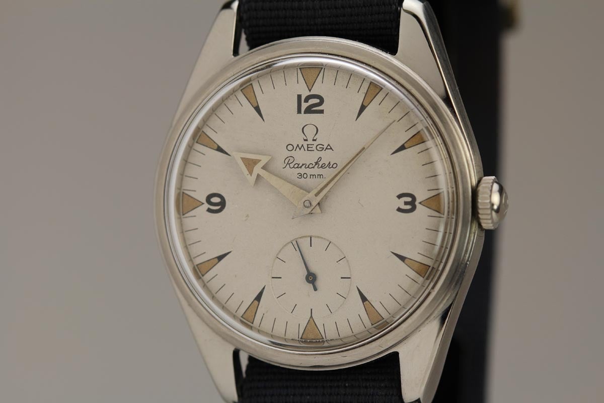 Omega stainless steel Ranchero wristwatch, Ref 2990-1, manual-wind movement number 17406700, aged white dial, black Arabic 12, 3, 9, luminous triangle markers, luminous arrow hands, subsidiary seconds at 6 o'clock, circa  1960s.