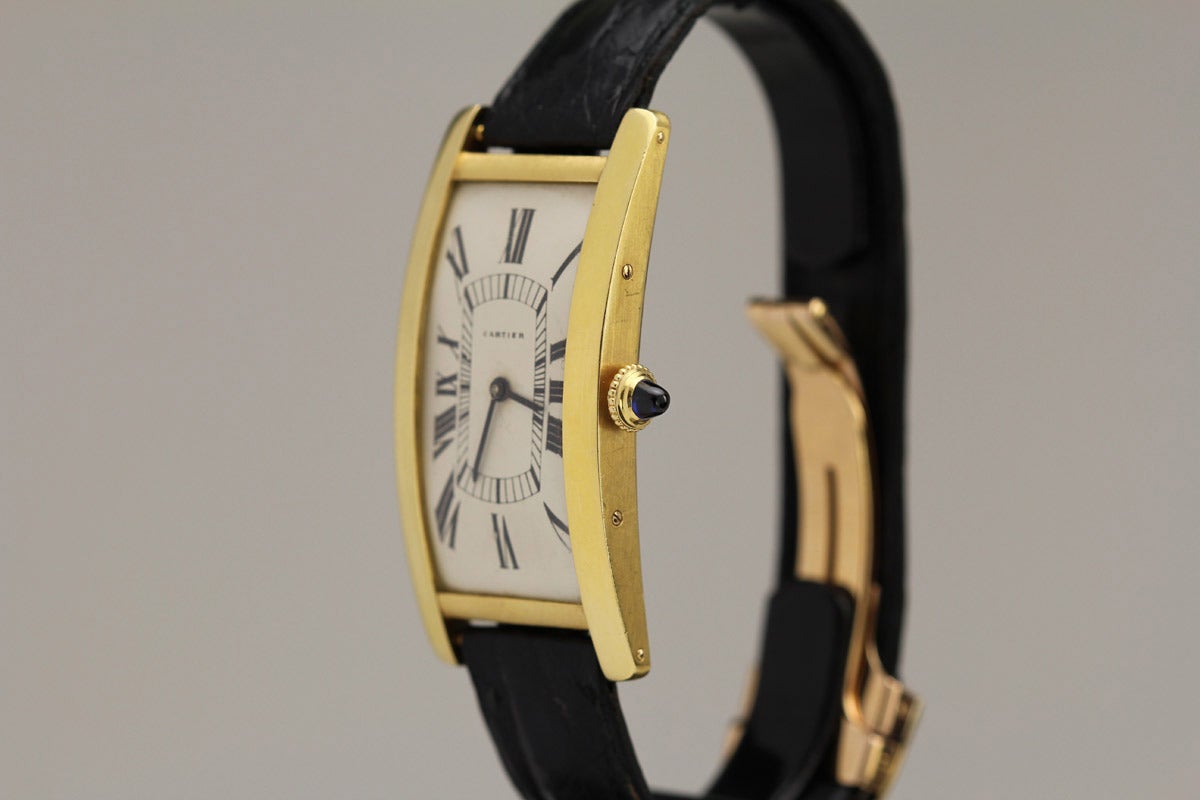 This is a great example of a large 18k yellow gold Cartier Tank Cintree from 1960s. This watch is highly collectible and very difficult to find. The watch case has its Cartier numbers and French hallmarks. The movement is signed by Cartier which was