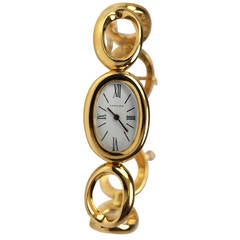 Montre bracelet Baignoire en or jaune de Cartier pour femme:: circa 1960s
