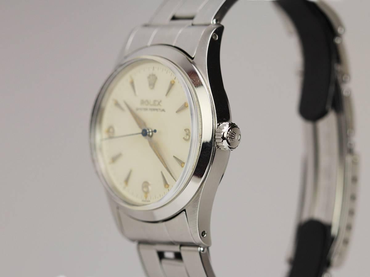 This is a minty 1950's Automatic Oyster Perpetual Rolex. The cream dial on this watch is a beauty, all original and has the lovely 3,6,9 on it. The case is nice and sharp. The watch comes with an original Rolex stretch rivet oyster bracelet. This is