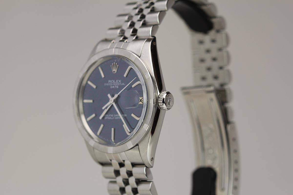 Rolex Date reference 1501 with engine-turned bezel, blue satin dial,and on a jubilee Rolex bracelet. Circa 1967.
