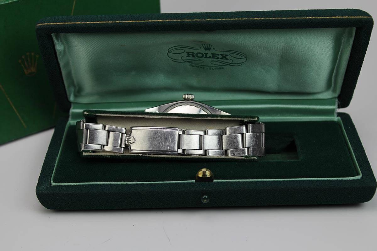 This is a classic Rolex Date reference 1500 on a rivet oyster bracelet. Complete with box and papers.