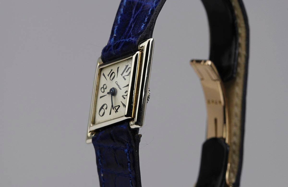 Rare Lozenge Shaped Cartier in white gold with a manual back wind movement
and original buckle deployant strap. Jaeger Le Coultre movement case made in Cartier London
