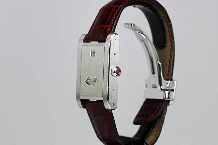 Cartier Platinum Tank A Guichet Jump Hour Montre-bracelet en édition  limitée sur 1stDibs