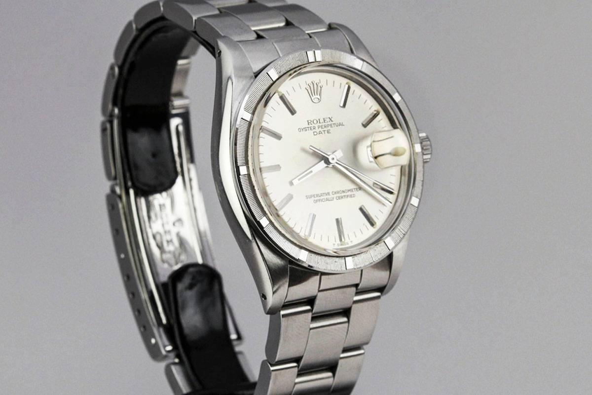 Rolex Date reference 1501 with engine-turned bezel, silvered dial,and on an oyster Rolex bracelet. Circa 1974.
