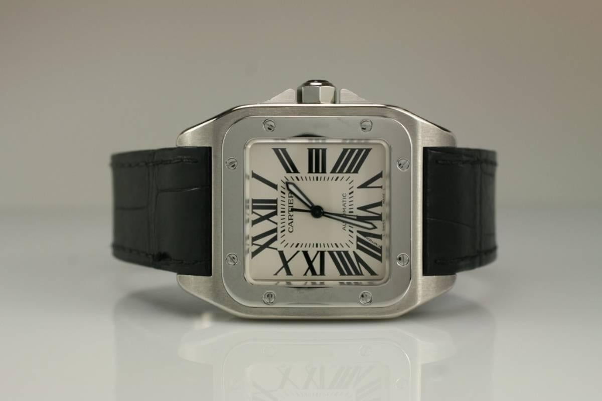 Cartier Santos 100 small wristwatch with automatic movement, Cartier strap and deployant clasp.