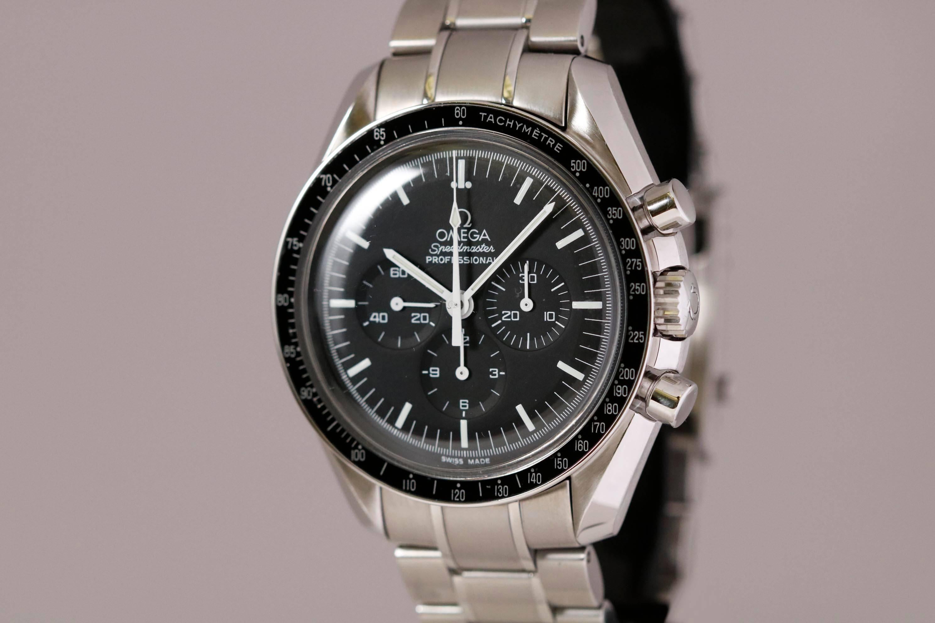 Pre-owned Omega Speedmaster Professional ref 145.002/345.002 chronograph with manual caliber 1861 movement, 42mm stainless steel case, two tone stainless steel bracelet with Omega deployant clasp. No box or papers. 