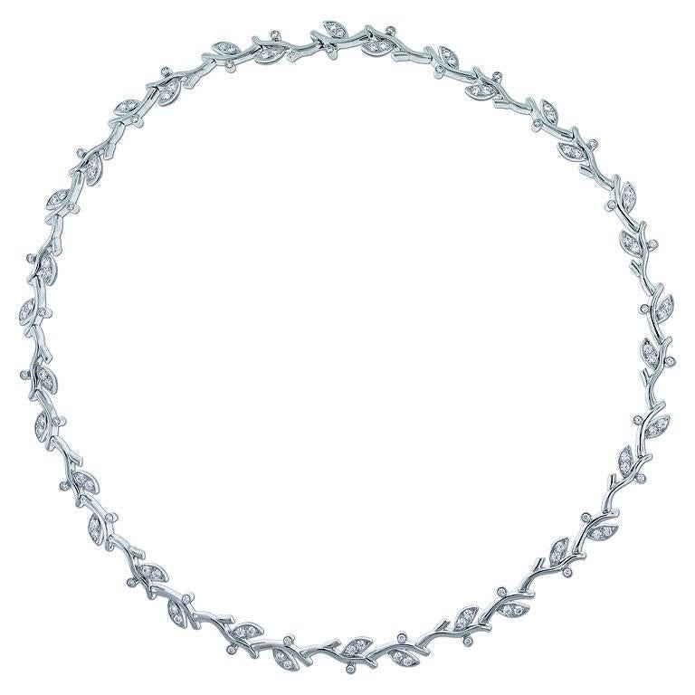 From Tiffany & Co.'s garland collection, a platinum diamond necklace. The necklace is set 102 shimmering brilliant diamond weighing approximately 2.50 carats. The necklace is the original 17 inches in length and lays perfectly on the neck.