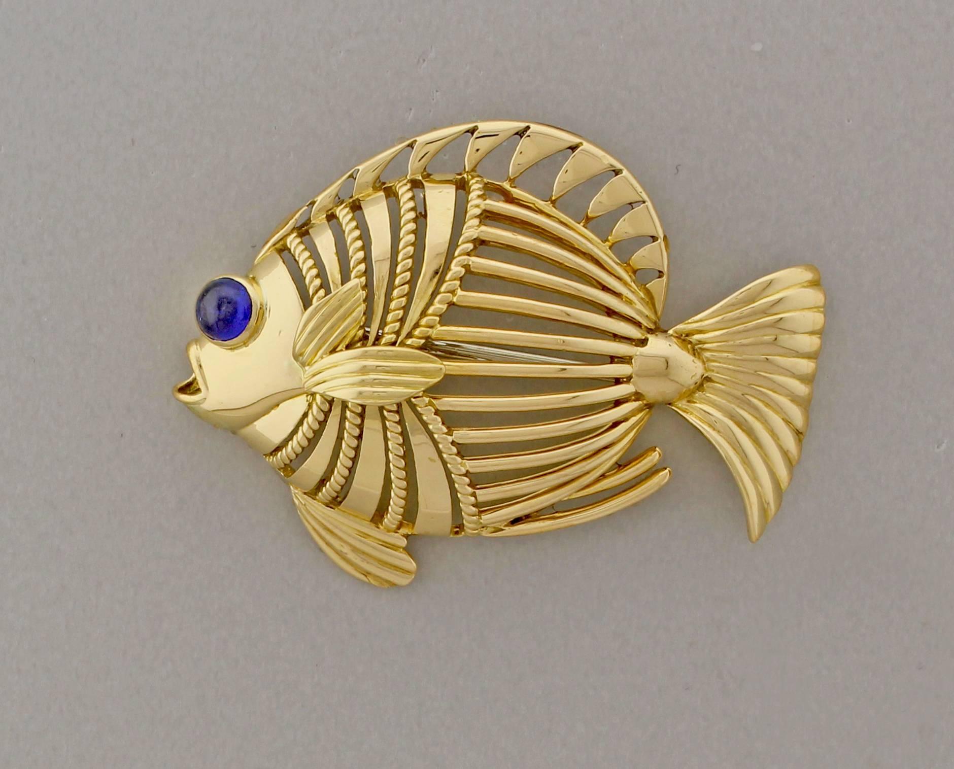 From Cartier, an 18 karat gold open design handmade fish brooch. An exceptional of Cartier's exemplary craftsmen ship. 1¼ x 1 inch 10grams
 