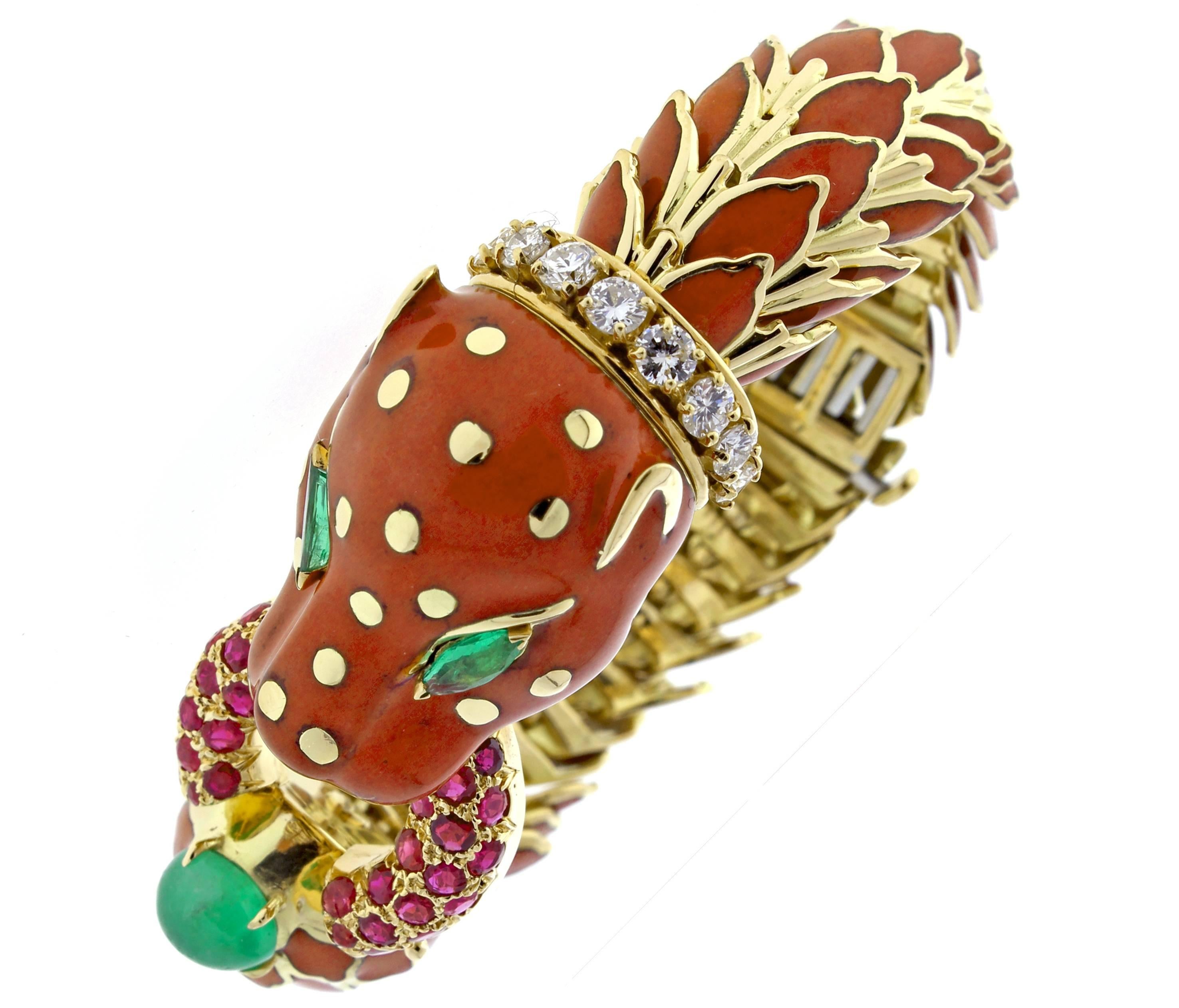 From David Webb's legendary Animal  Kingdom Collection,  his imaginary sea serpent bracelet. Crafted in  
 enamel of a vibrant cinnabar with over a carat of diamond, rubies and emeralds.   The bracelet is in pristine condition and will fit a six