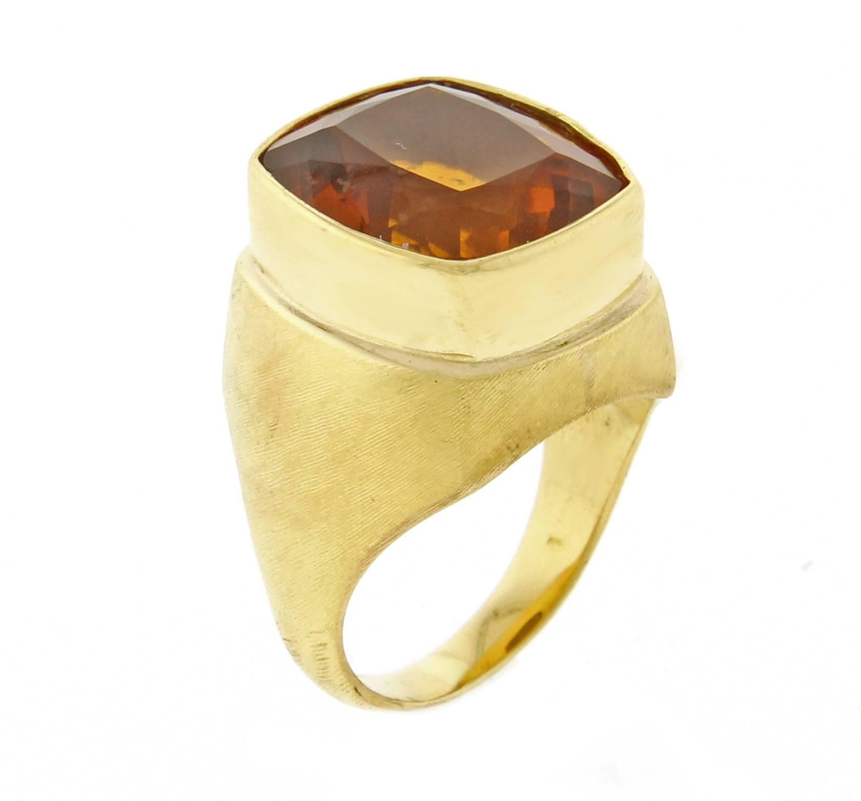 rushed 18 karat gold citrine ring by world renowned Brazilian jeweler Haroldo Burle Marx (1911-1991). The ring features a bezel set 15*12.5mm cushion cut citrine weighing 11 carats.  Size 6 adjustable