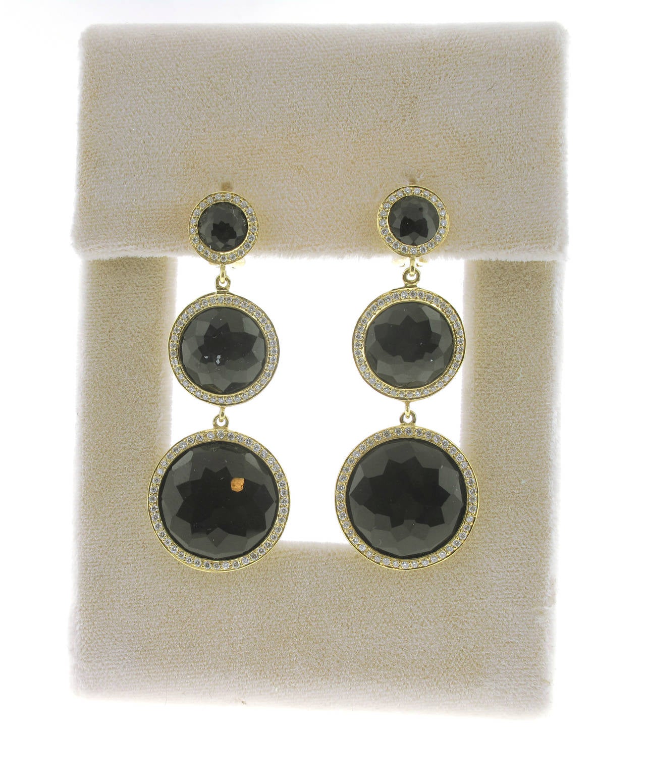These Ippolita Gold Rock Candy 3-Drop Earrings are made in 18 karat yellow gold and feature 6 