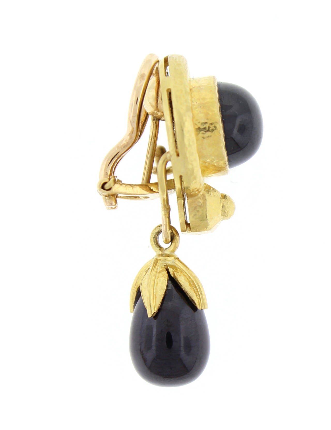 19 karat yellow gold  Elizabeth Locke  black spinel drop earring. The bottom drops spinels are detachable. The post fold back and can be worn as both clips or for pierced ears.