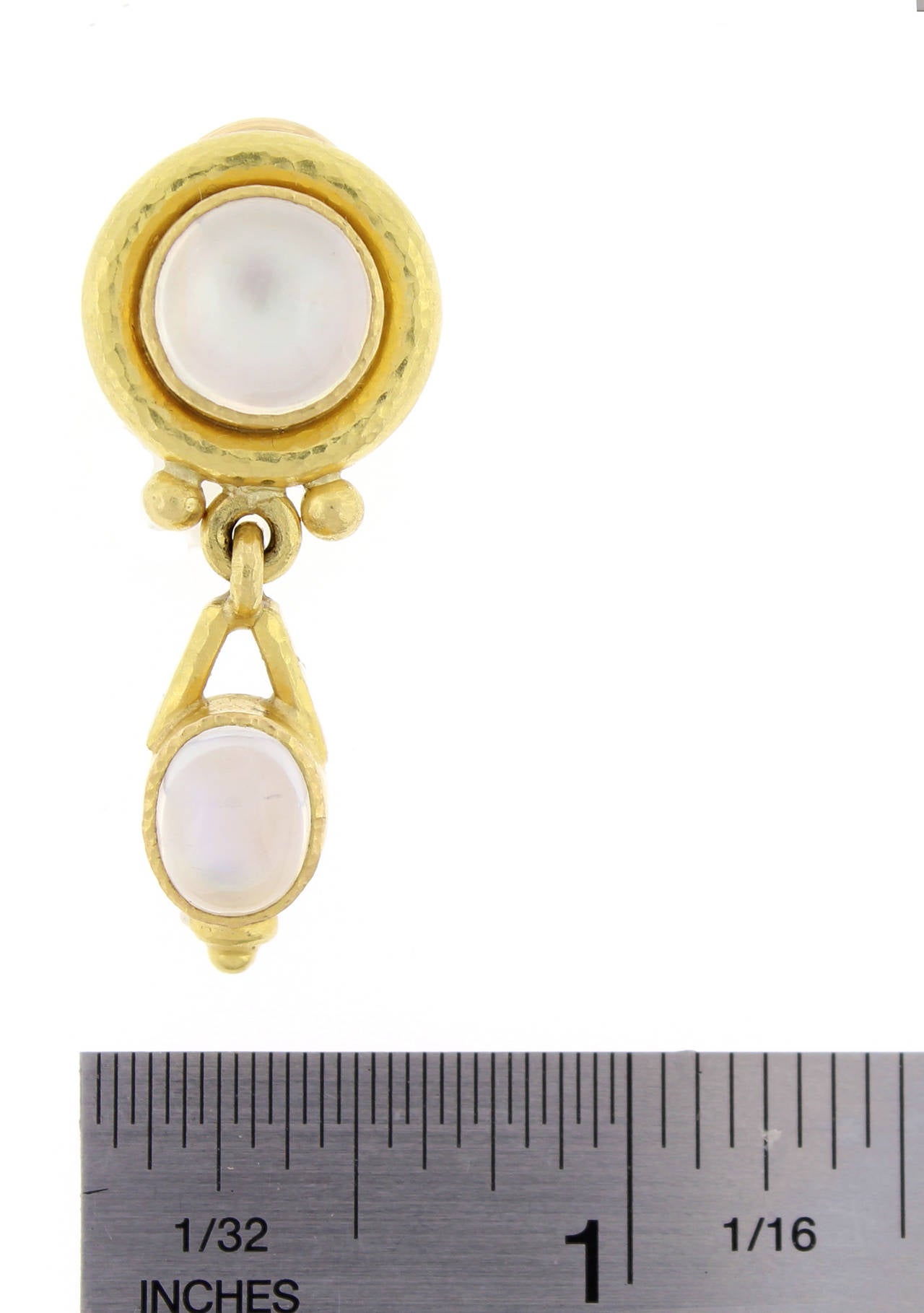 19 karat yellow gold Elizabeth Locke Moonstone Drop Earrings. The posts fold down allowing the earrings to be worn as clips or for pierced ears .