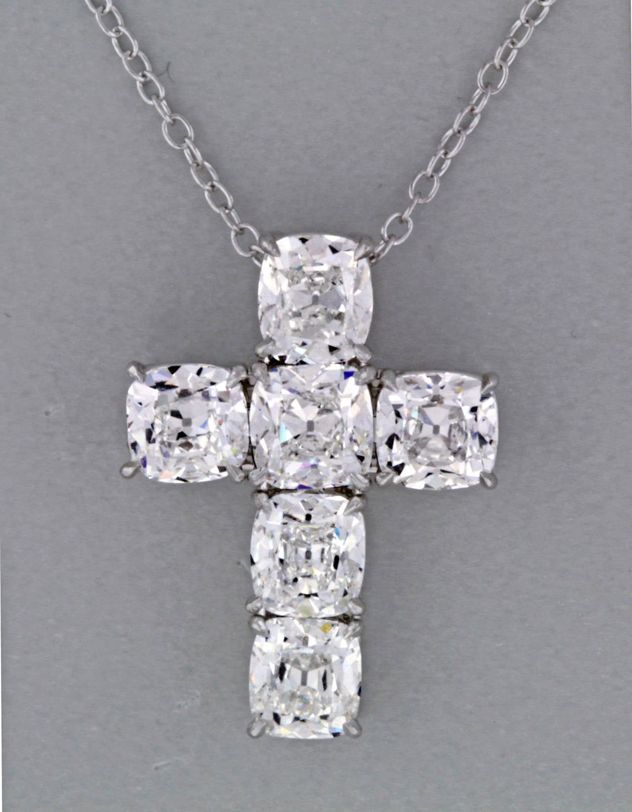 Set with six magnificent one carat cushion cut diamonds weighing  6.21.  The diamonds are E-F color, VS clarity with each having an individual GIA report.  

Ronald Abram was founded in Hong Kong in 1987. With their flagship salon located in the