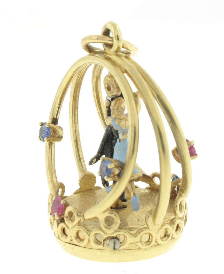 In the 1960's, American jeweler Henry Dankner & Sons created and patented this most unique jewel, the Living Charm. Very few of these precious treasures were ever made. When  the charm is wound, dancers waltz. The charm is in 14K yellow gold and