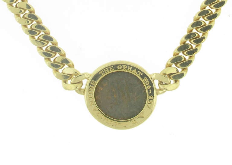 This Bulgari coin Necklace features a coin with the face of Constantine the Great on one side and a male figure on the other. The necklace is 18 karat yellow gold and measures 15.5 inches in length. The pendant itself is 20 millimeters in diameter.