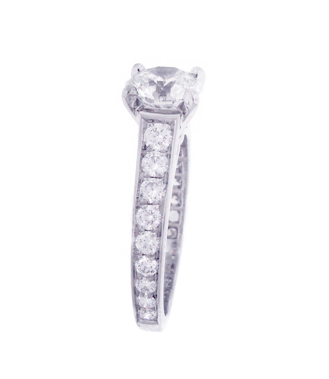 This solitaire has been a Cartier classic since 1895. The elegance of the lines is unique, the refined and light setting allows the light of the diamond to flow freely.

Diamond 1.15 carat F VVS2 GIA 3EX
18 Diamond=.93

Set Platinum, size 4 1/2