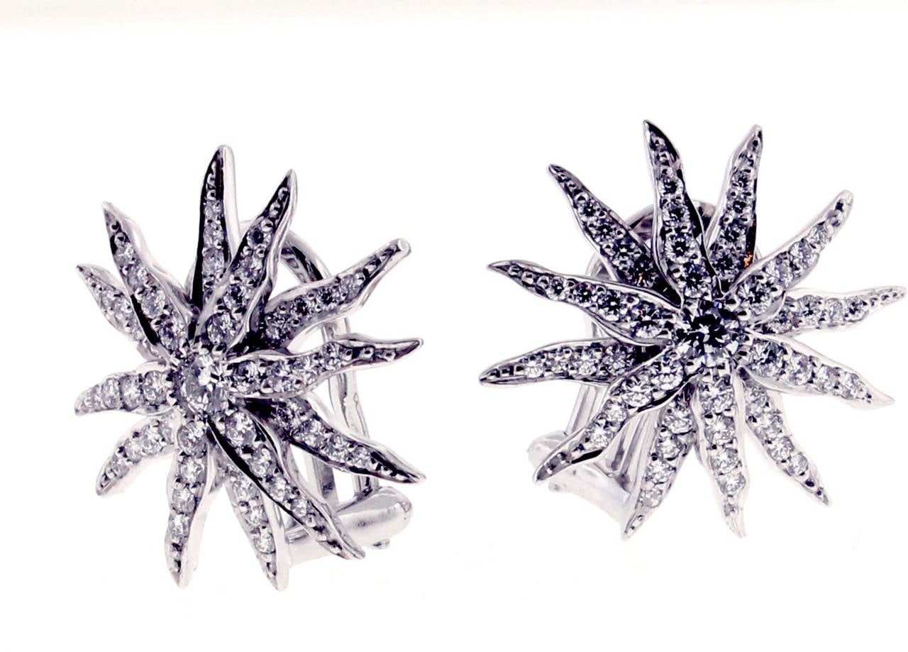 The iconic Tiffany & Co diamond sunburst. Ninety eight shimmering diamonds   weighing .90 carats are set in platinum and form a dazzling array of brilliance.
