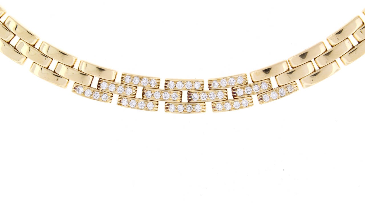 A three row link necklace in 18 karat yellow gold with 48 diamonds weighing 1.20 carats. The quality and weight of this elegant piece is all you would expect from one of the best jewelry houses in the world.