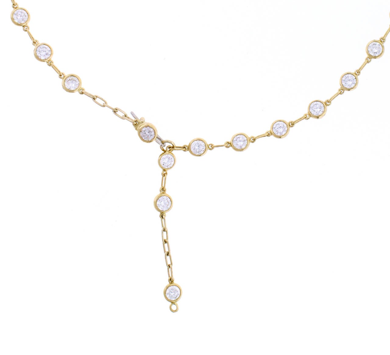 Tiffany round diamonds catch the light and make it dance. Diamond by the Yard Necklace in 18 karat gold with 44 diamonds weighing 6.60 carats. Original clasp design allows the necklace to be shortened to various lengths. Designed by Elsa Peretti