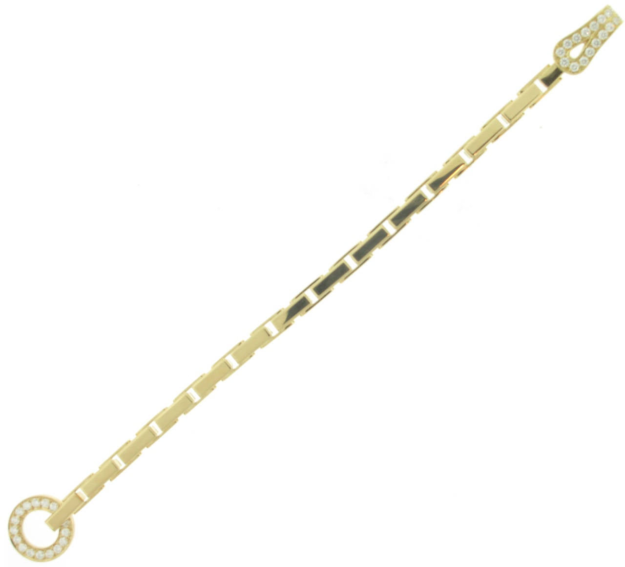 Cartier has borrowed the central motif of this jewelry collection from the world of Haute Couture. Inspired by the clasps of the corsets that defined the Parisian silhouette, Agrafe exudes elegance and refinement. Set in 18 karat yellow gold with