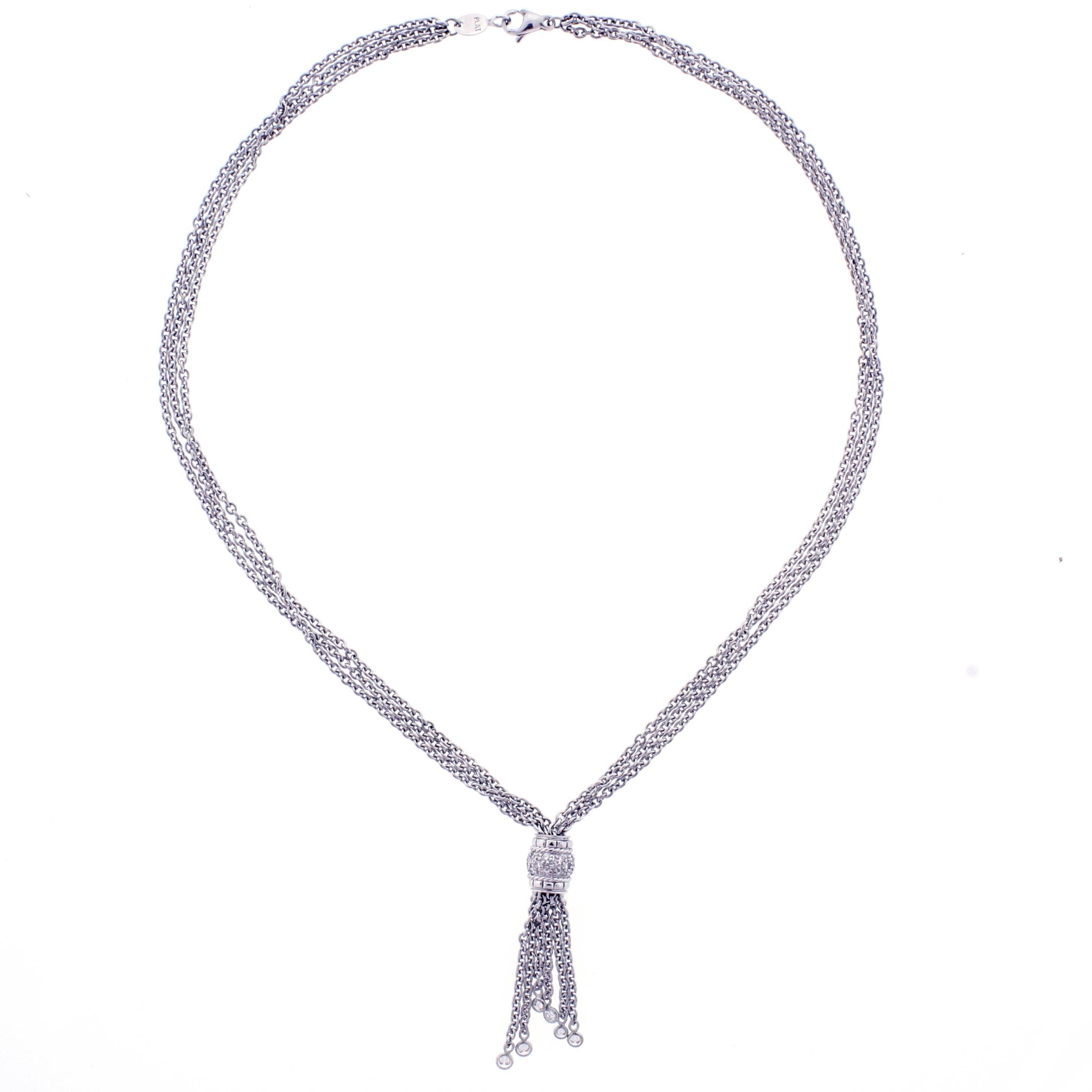 From award winning fine jewelry designer Penny Preville. a diamond tassel necklace. the necklace is comprised of three  strands of platinum and 32 brilliant diamonds weighing one carat. 16 inches