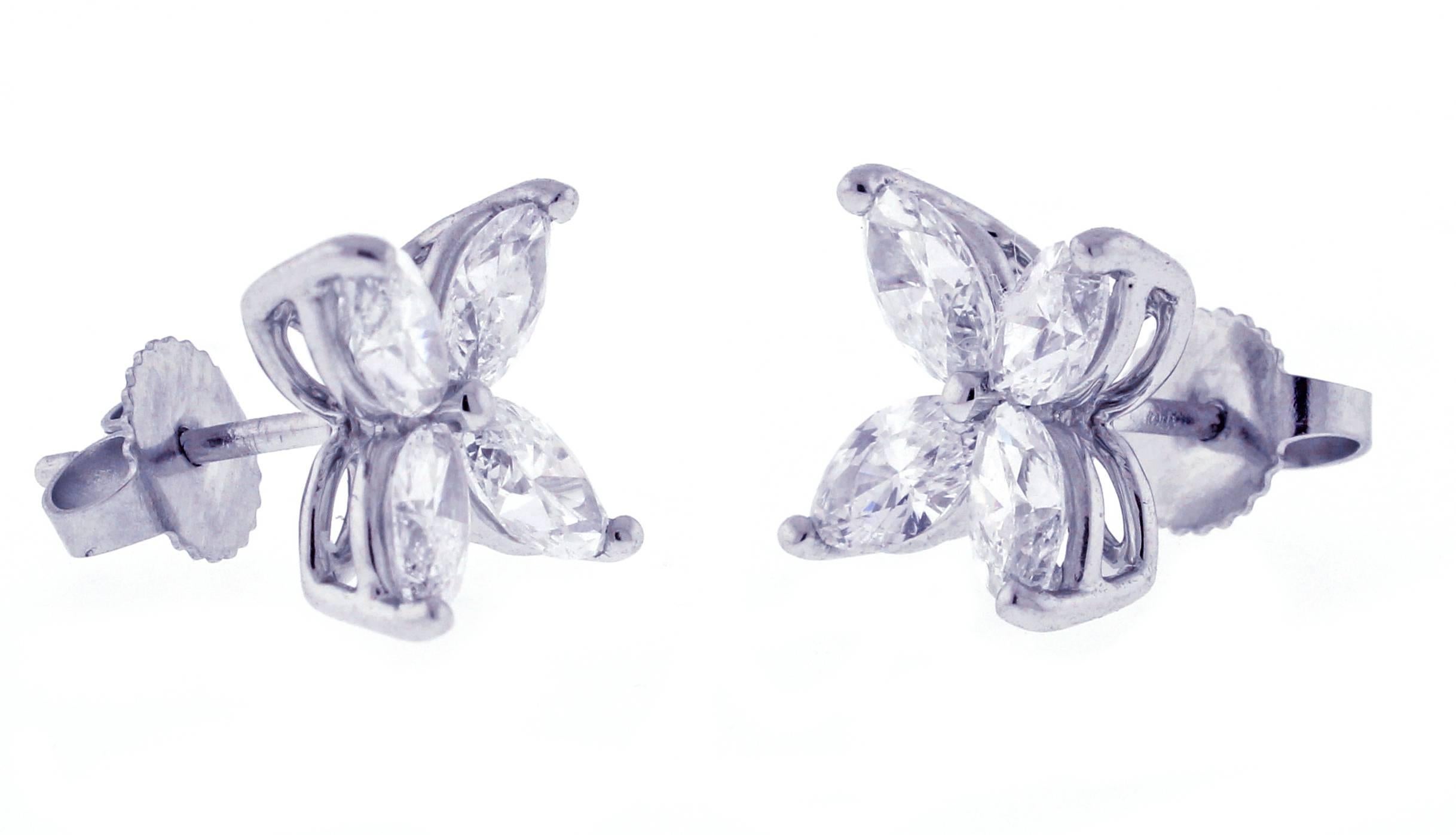 With an intensity that rivals the night sky, Tiffany Victoria celebrates the brilliance of Tiffany diamonds. The unique shape of these classic diamond earrings allows the diamonds to play off of each other's brilliance.  Eight marquise diamonds