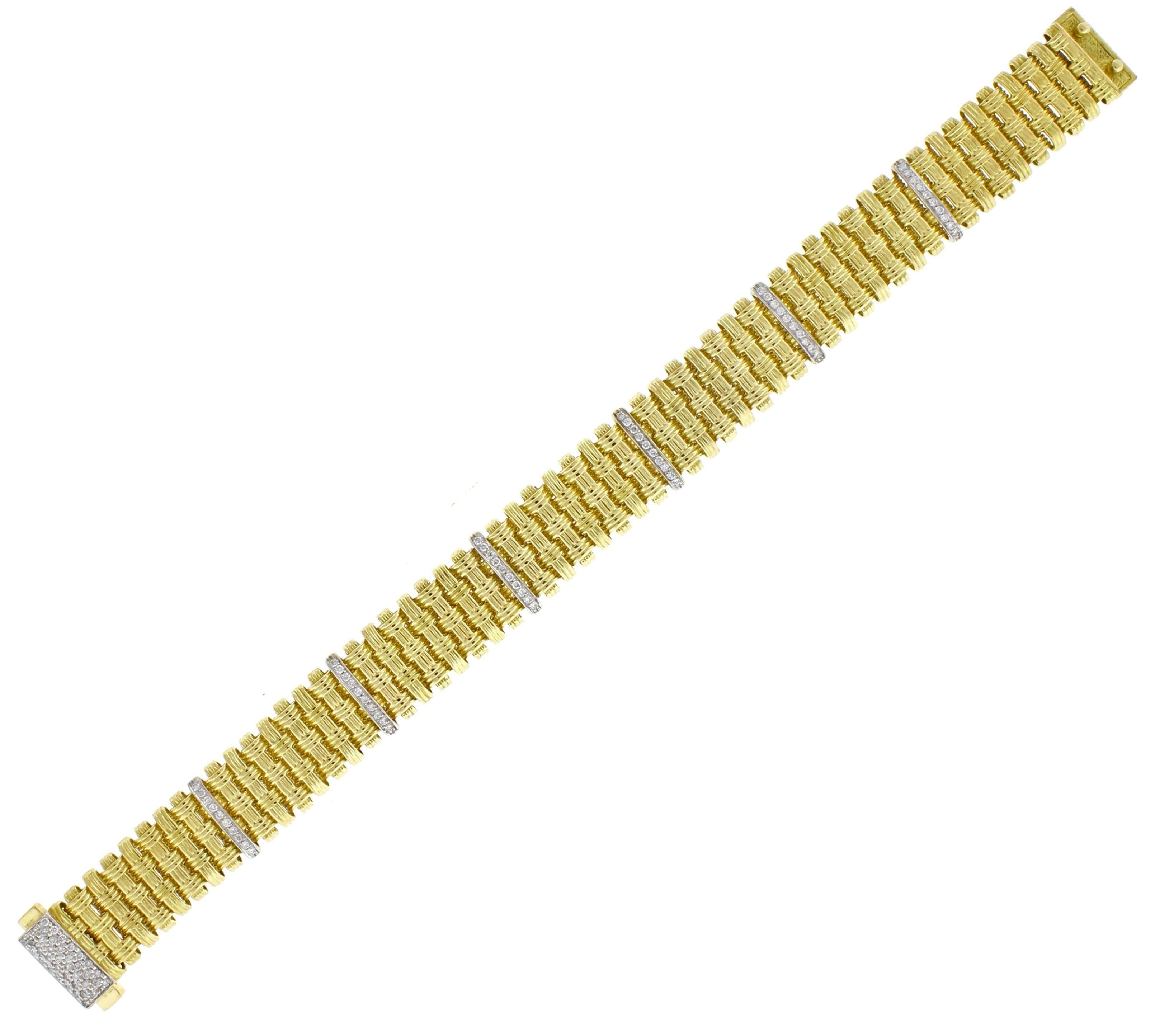 Tightly woven strands of 18 karat gold are the signature of Roberto Coin's Appassionata collection This five row diamond bracelet boasts 98 brilliant diamonds weigh approximately .50 carats. 42 grams.  7 1/8 long 1/2 inch + wide.