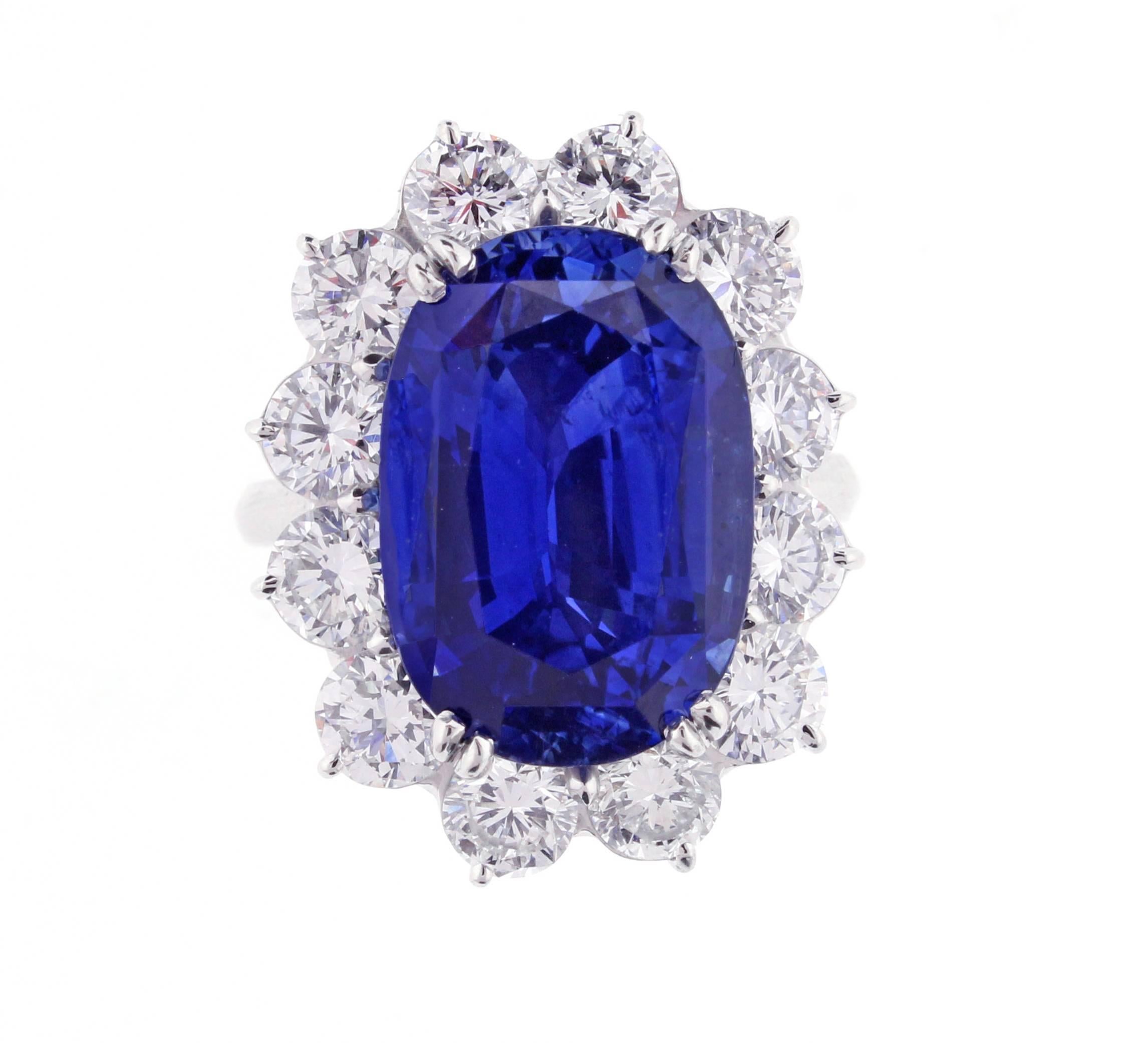 An impressive oval Ceylon sapphire weighing 17.18 carats surrounded by 12 fine brilliant diamonds weighing 4.25. The sapphire a boasts a rich blue fully saturated color. The sapphire is accompanied by a G.I.A report stating the origin as Sri Lanka