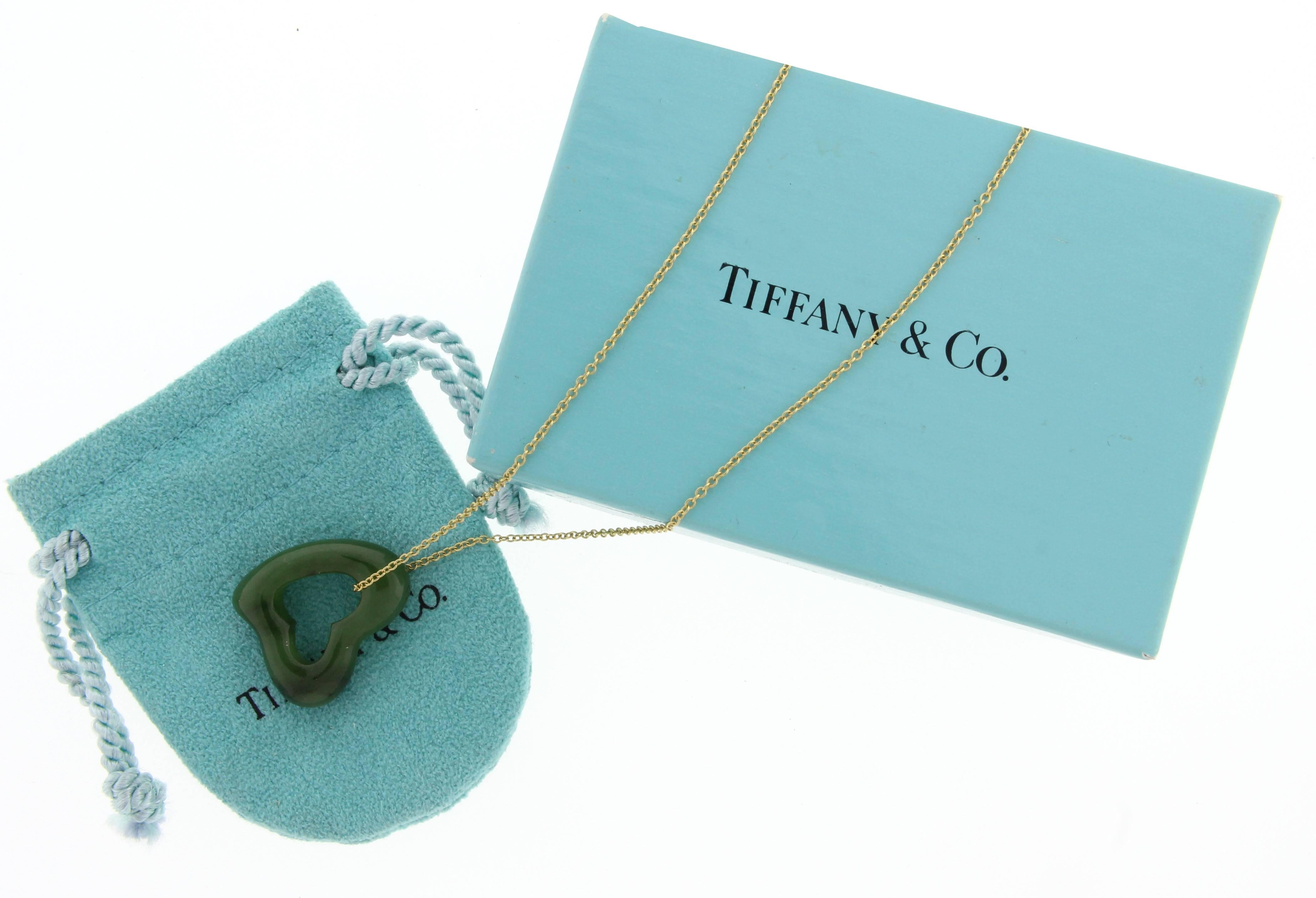 The open heart necklace is one of the most iconic of all Elsa Peretti's designs. Carved from green jade this large (23mm) open heart is suspended from an 18 karat 16 inch chains