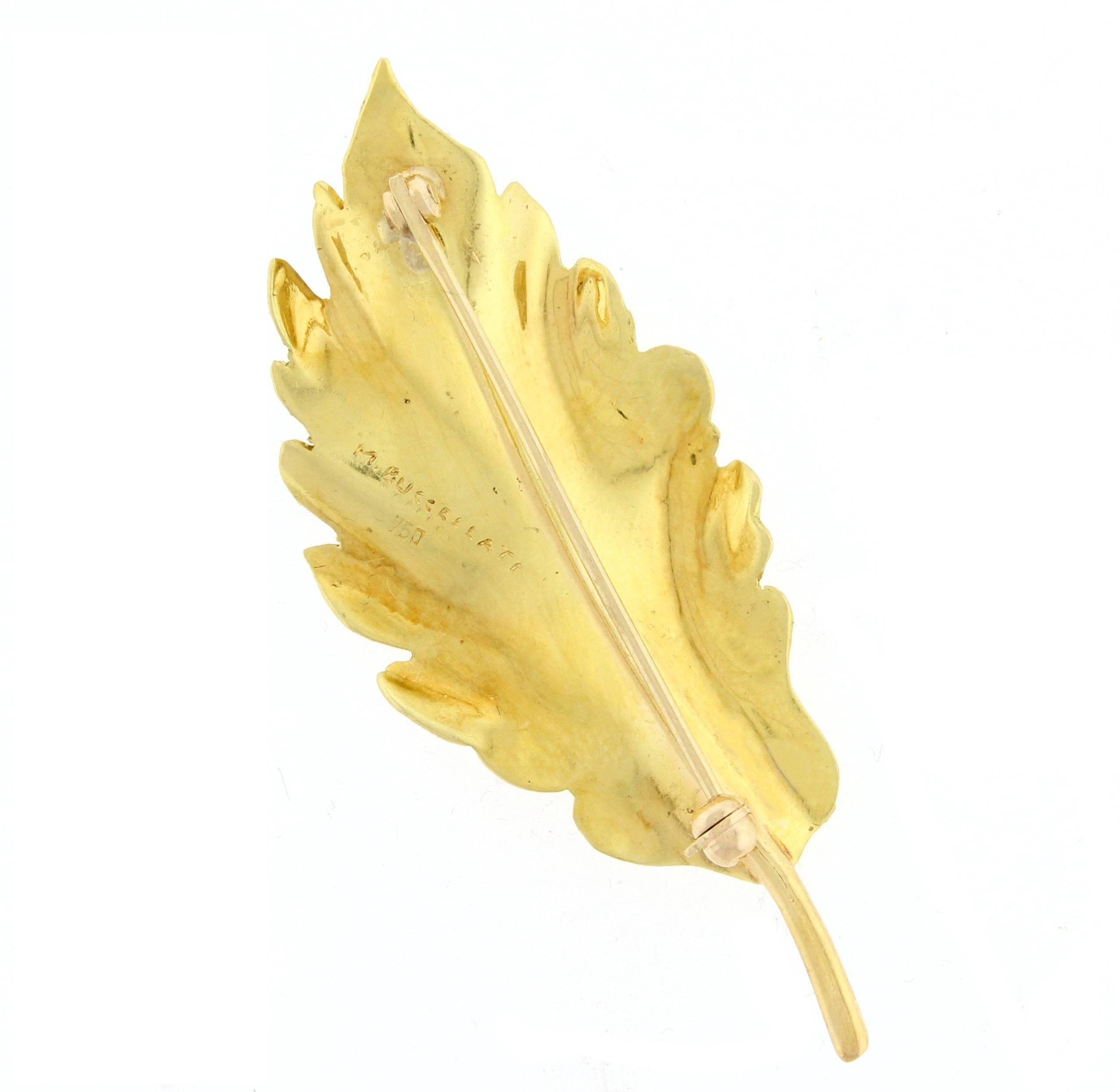 From famed Italian jeweler Mario Buccellati this wonderful leaf brooch
The 18 karat yellow gold brooch measures 2.1/8  x 7-8  of an inch and weighs 4.2 grams.