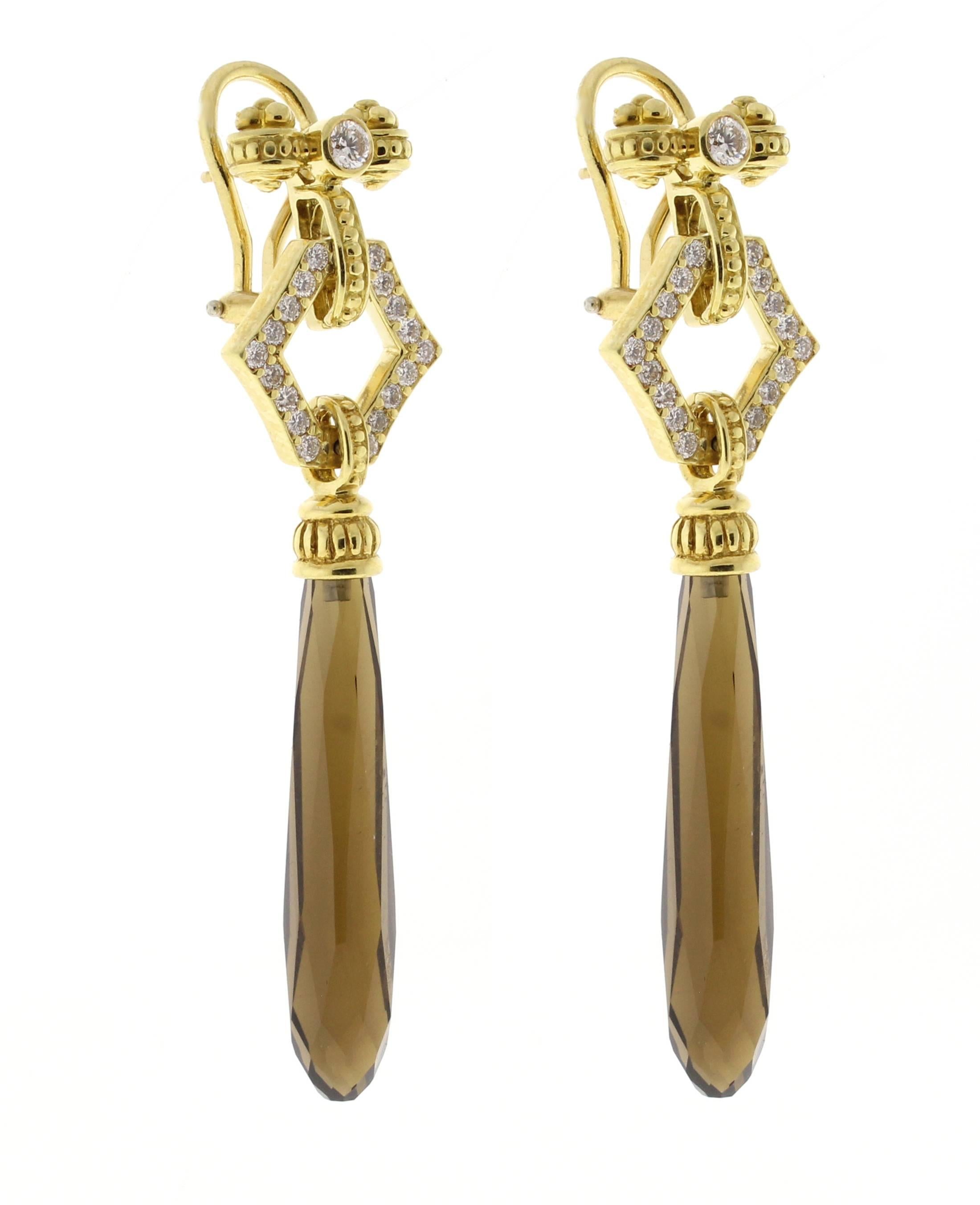 From acclaimed designer Steven Lagos, a dramatic pair of 18 karat yellow gold and diamond  brown citrine briolette drop earrings. The earrings measure 2 3/8 of an inch over all with 38 brilliant diamonds weighing .75. 
 