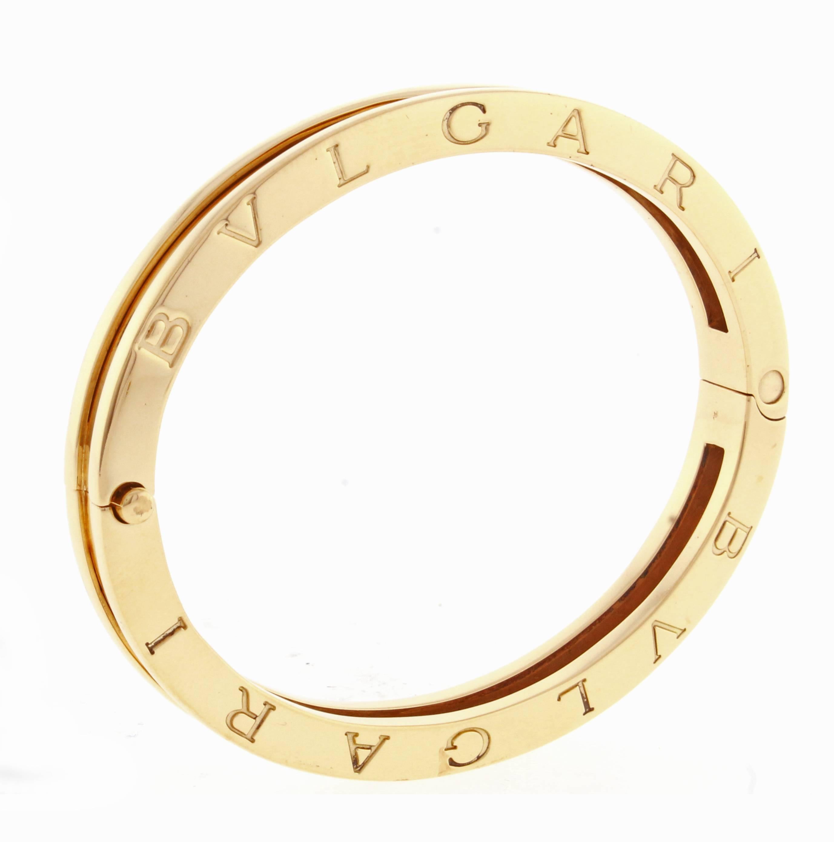 From Bulgari,  the Bvlgari B.Zero1 18 karat yellow gold bangle bracelet. This is the original, highly sought after, full weight design. 1/4 inch wide, fits up to a 6 1/2 inch wrist.  57.3 grams 
