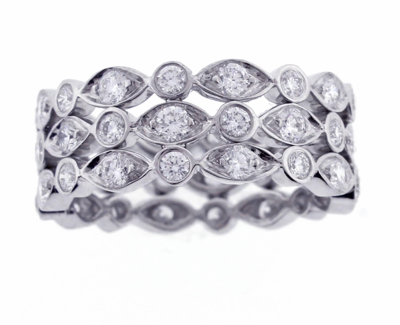 From the Jazz collection by Tiffany & Co., a three row diamond platinum band-ring. The ring is comprised of 48 brilliant diamonds weighing approximately 1.40 carats. 8mm wide, size 6 1/2. This is a new ring, never worn. 