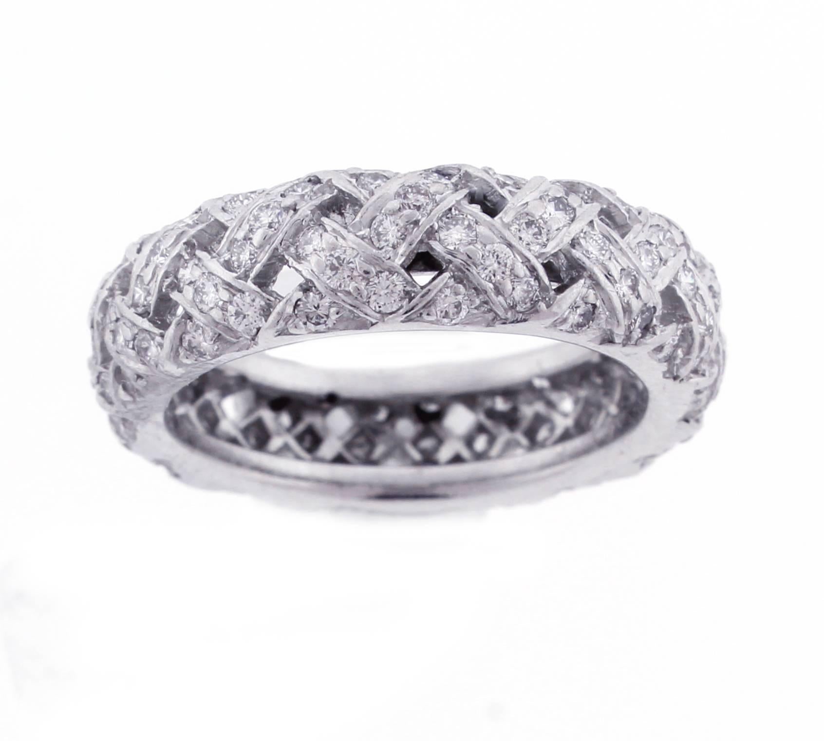 From the the Vannerie collection by Tiffany & Co., a  basket weave platinum diamond band ring. The ring is comprised of 115 brilliant diamonds weighing approximately 1.10 carats. 5.5 mm wide , size 5