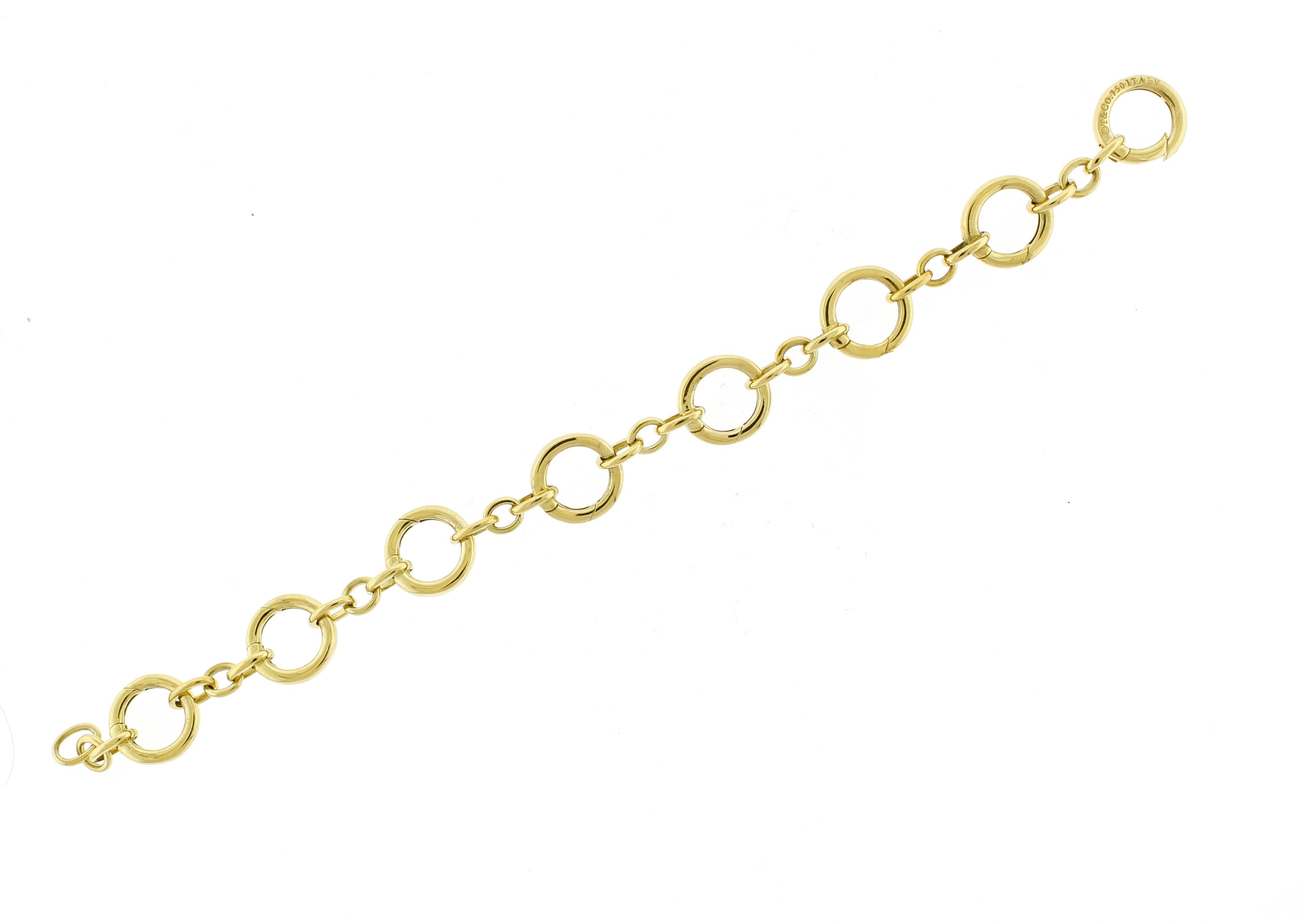 Women's or Men's Tiffany & Co. 18k Yellow Gold Charm Bracelet For Sale