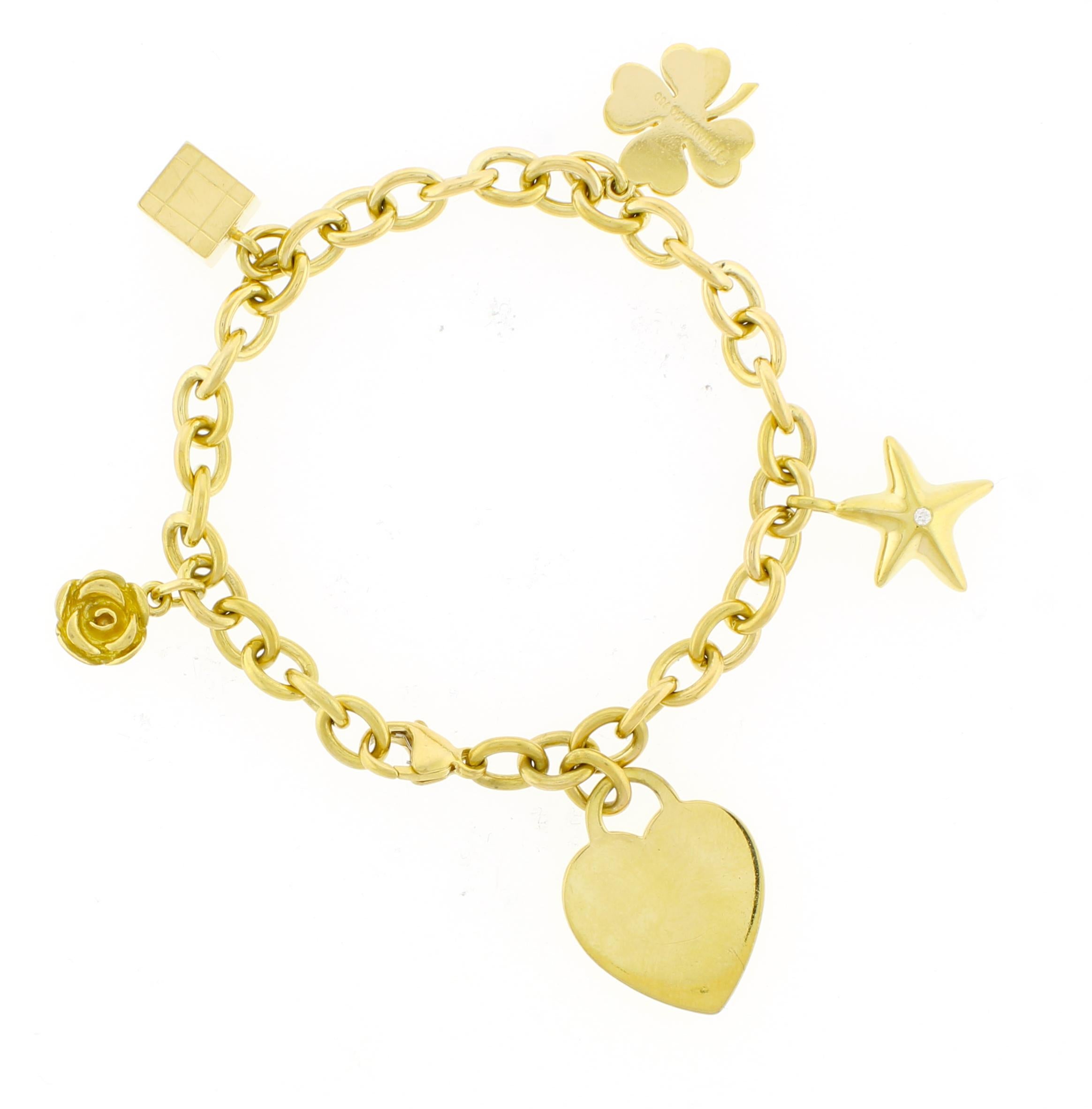 Tiffany & Co. Pulsera con dije de oro amarillo de 18 quilates en venta 1