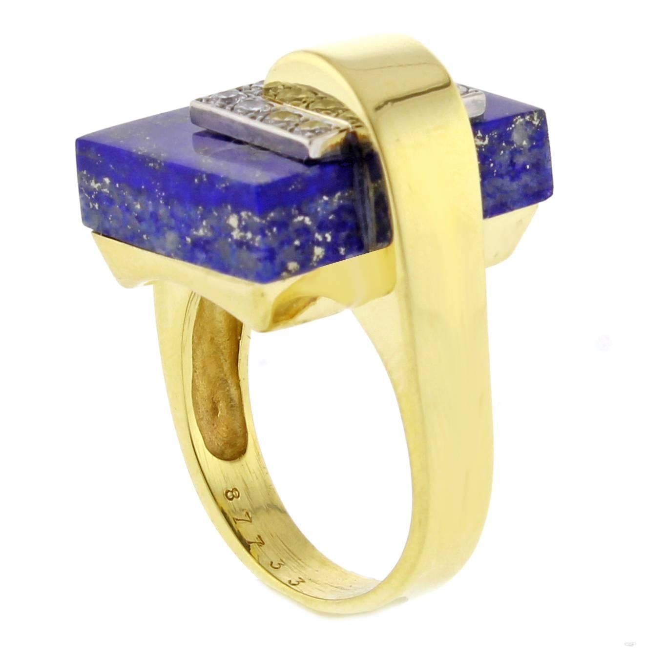From Cartier, this  18 karat 1960s lapis and diamond ring. The ring features a  19.5*4.7 rectangular lapis and 10 brilliant diamonds weighing .30 carats Signed Cartier (partially obscured. Size 8.5 adjustable