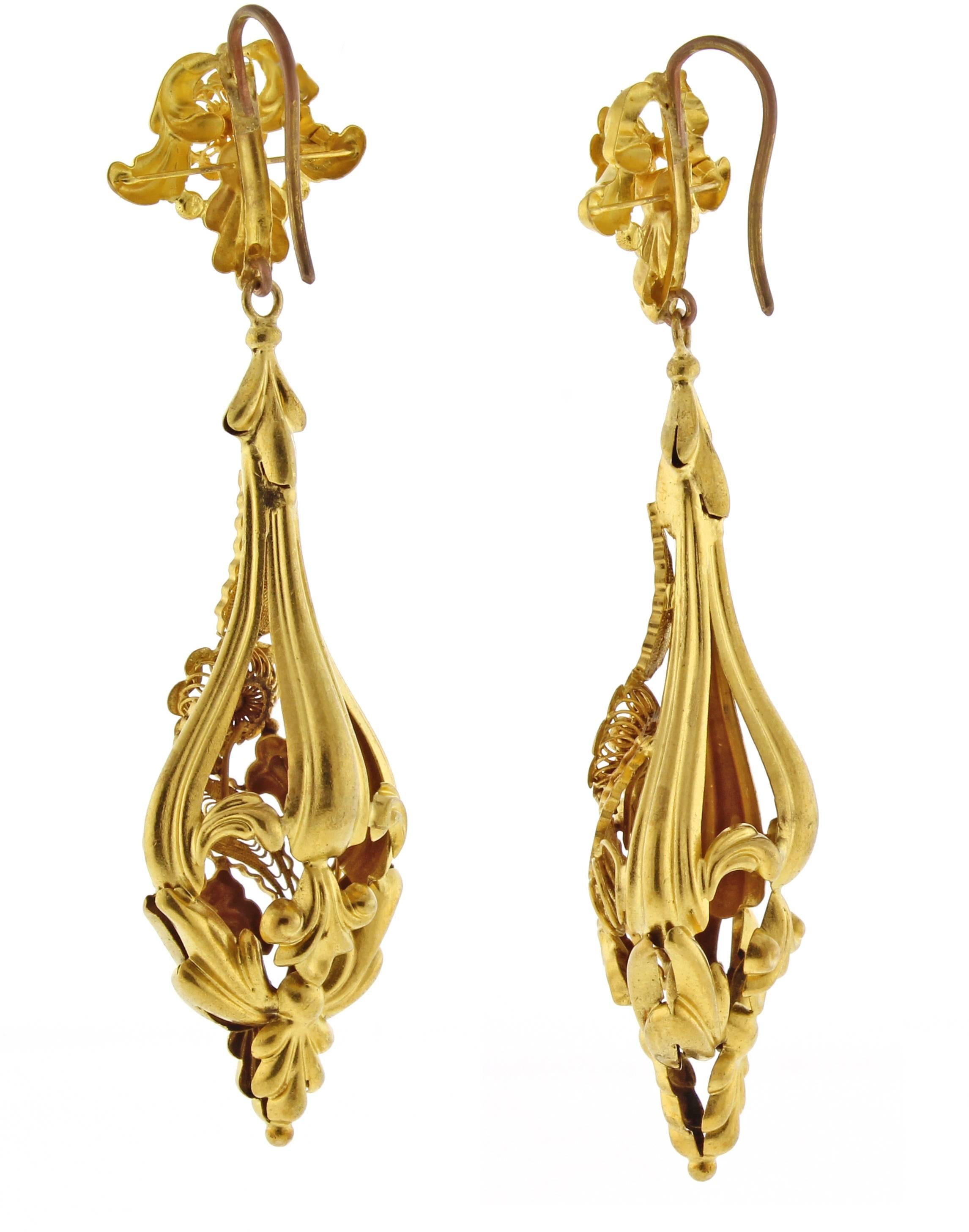 These fabulous 14 karat gold earring feature marvelous craftsmanship and stunning design.  Circa late 19th century. 2.5 inch long  