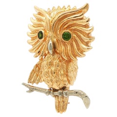 Spilla a forma di gufo in oro giallo e bianco 14kt